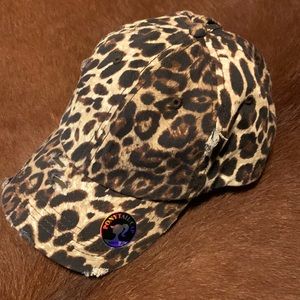Leopard ponytail baseball hat. Never worn.